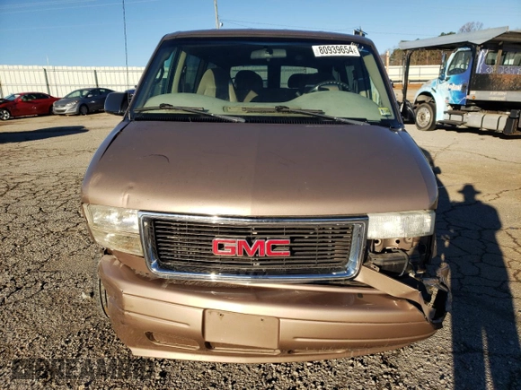 2003 GMC Safari z VIN 1GKDM19X13B513153, wystawiony jako Copart lot #80939654 z przebiegiem 177 037 mil mil oraz Czysty tytuł • Clean title. Historia ofert i sprzedaży dostępna na DreamBid. Obrazek 5.