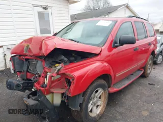 2004 Dodge Durango Limited z VIN 1D4HB58D94F111363, wystawiony jako IAAI lot #41440895 z przebiegiem 128 897 mil mil oraz . Historia ofert i sprzedaży dostępna na DreamBid. Obrazek 2.