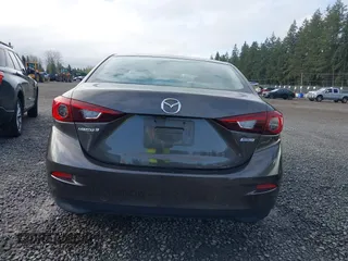 2016 Mazda 3 i Sport with VIN JM1BM1T7XG1298654, listed as a IAAI auction lot 41946415 with 114,894 mi miles and . Bid and sale history available at carsss.com. Image 16.