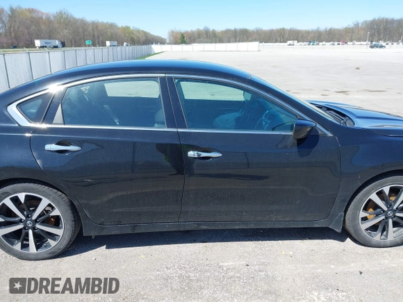 2018 Nissan Altima SV with VIN 1N4AL3AP5JC285843, listed as a IAAI auction lot 41956374 with 100,688 mi miles and . Bid and sale history available at carsss.com. Image 13.