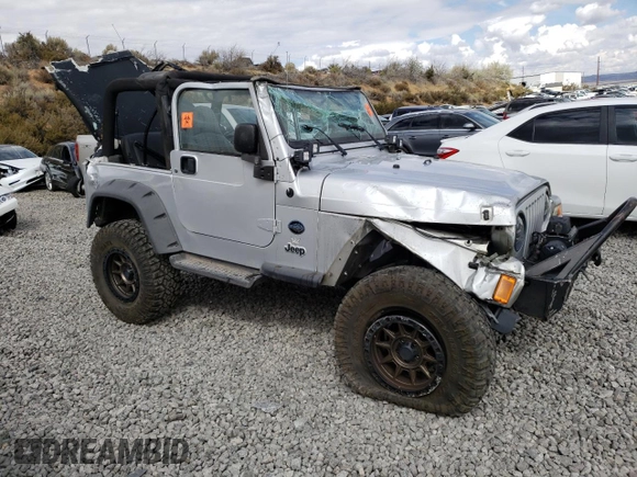 2003 Jeep Wrangler Sport with VIN 1J4FA49SX3P369375, listed as a Copart auction lot 71309184 with 0 mi miles and Salvage Title. Bid and sale history available at carsss.com. Image 4.