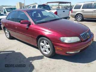 2001 Cadillac Catera z VIN W06VR54R01R003061, wystawiony jako IAAI lot #41989882 z przebiegiem 77 248 mil mil oraz . Historia ofert i sprzedaży dostępna na DreamBid. Obrazek 1.