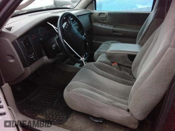 2003 Dodge Dakota SLT with VIN 1D7HL42N23S226033, listed as a Copart auction lot 83297194 with 0 mi miles and Salvage Title. Bid and sale history available at carsss.com. Image 7.