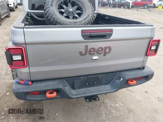 2021 Jeep Gladiator Mojave with VIN 1C6JJTEG9ML519309, listed as a IAAI auction lot 41701544 with 64,461 mi miles and . Bid and sale history available at DreamBid. Image 16.