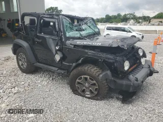 2015 Jeep Wrangler Rubicon with VIN 1C4HJWCG0FL755717, listed as a Copart auction lot 61375435 with 153,207 mi miles and Salvage title. Bid and sale history available at DreamBid. Image 4.