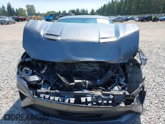 2020 Ford Mustang EcoBoost z VIN 1FA6P8TH9L5167587, wystawiony jako IAAI lot #42407141 z przebiegiem 38 757 mil mil oraz . Historia ofert i sprzedaży dostępna na DreamBid. Obrazek 13.