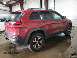 2015 Jeep Cherokee Trailhawk with VIN 1C4PJMBB8FW576765, listed as a Copart auction lot 49097925 with 299,877 mi miles and Clean Title. Bid and sale history available at DreamBid. Image 3.