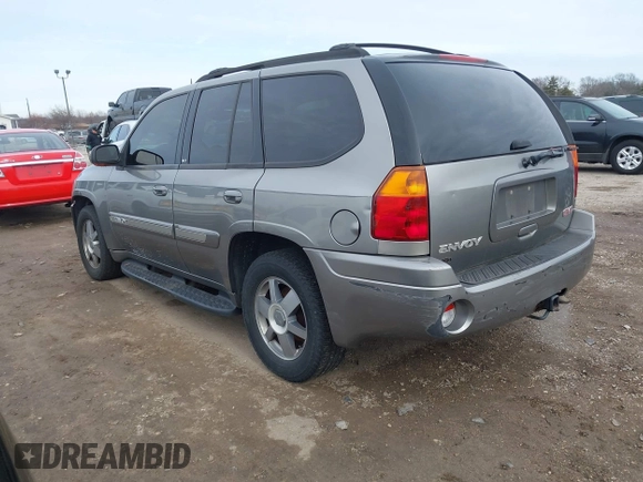2005 GMC Envoy SLT with VIN 1GKDT13S352129944, listed as a IAAI auction lot 41527180 with 188,541 mi miles. Bid and sale history available at carsss.com. Image 3.