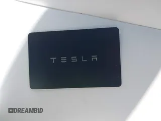 2024 Tesla Model Y with VIN 7SAYGDED9RF161420, listed as a IAAI auction lot 41892788 with 12,353 mi miles and . Bid and sale history available at DreamBid. Image 11.