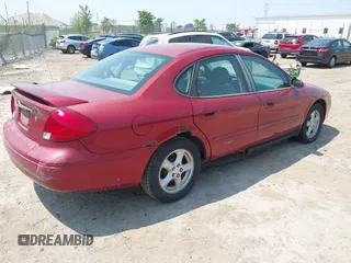 2003 Ford Taurus SE Standard with VIN 1FAFP53UX3G124702, listed as a IAAI auction lot 42463606 with 129,874 mi miles and . Bid and sale history available at DreamBid. Image 4.