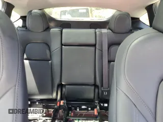 2024 Tesla Model Y Long Range с VIN 7SAYGDEE2RF988958, выставлен на аукционе Copart как лот 58066795 с пробегом 26 356 миль миль и Списание • Salvage title. История ставок и продаж доступна на DreamBid. Изображение 10.