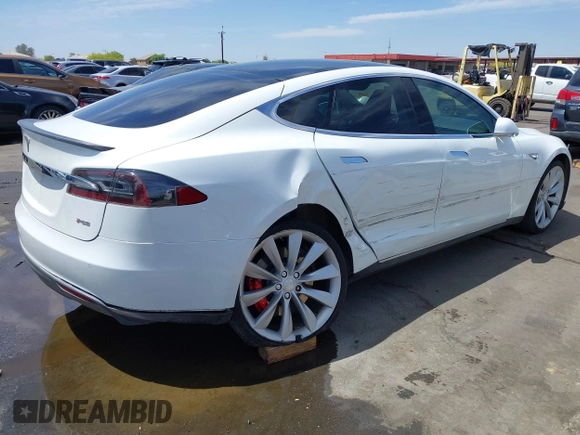 2014 Tesla Model S 60 z VIN 5YJSA1H13EFP33659, wystawiony jako IAAI lot #42101491 z przebiegiem 113 460 mil mil oraz . Historia ofert i sprzedaży dostępna na DreamBid. Obrazek 6.