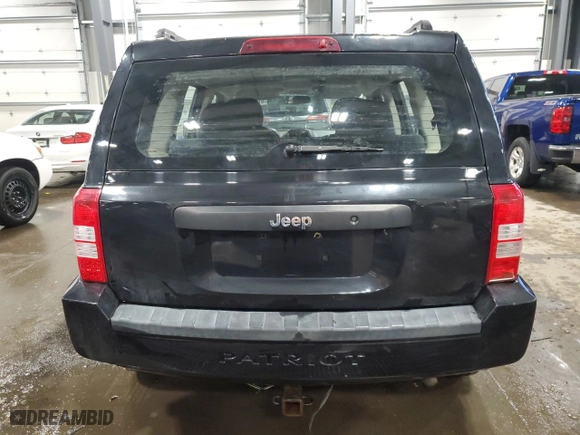 2010 Jeep Patriot Sport with VIN 1J4NT2GB7AD503156, listed as a Copart auction lot 87705575 with 160,397 mi miles and Salvage Title. Bid and sale history available at carsss.com. Image 6.