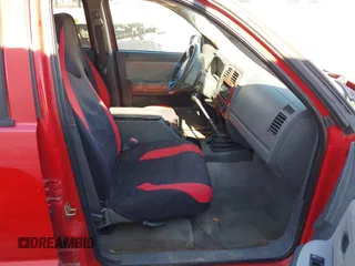 2005 Dodge Dakota SLT z VIN 1D7HE48K85S297456, wystawiony jako IAAI lot #41813718 z przebiegiem 192 229 mil mil oraz . Historia ofert i sprzedaży dostępna na DreamBid. Obrazek 5.