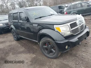 2009 Dodge Nitro SLT with VIN 1D8GU58K19W525618, listed as a IAAI auction lot 41726192 with 999,999 mi miles. Bid and sale history available at carsss.com. Image 1.