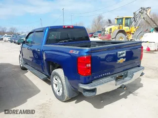 2014 Chevrolet Silverado 1500 LT with VIN 3GCUKREC0EG411632, listed as a IAAI auction lot 41890539 with 106,315 mi miles. Bid and sale history available at carsss.com. Image 3.