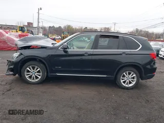 2014 BMW X5 xDrive35i z VIN 5UXKR0C51E0H26528, wystawiony jako IAAI lot #42027626 z przebiegiem 87 228 mil mil oraz . Historia ofert i sprzedaży dostępna na DreamBid. Obrazek 14.