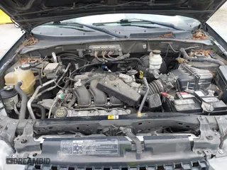 2007 Ford Escape XLT with VIN 1FMYU03127KA07084, listed as a IAAI auction lot 41931906 with 129,897 mi miles. Bid and sale history available at carsss.com. Image 10.