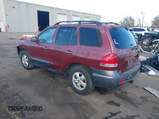 2005 Hyundai Santa Fe GLS with VIN KM8SC73E05U027078, listed as a IAAI auction lot 41265050 with 218,841 mi miles. Bid and sale history available at carsss.com. Image 3.