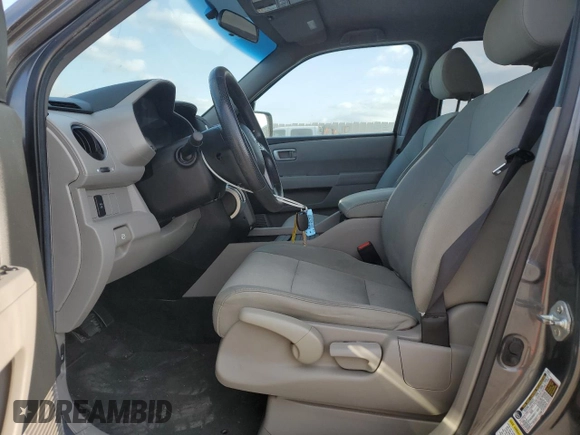 2011 Honda Pilot LX with VIN 5FNYF4H23BB094345, listed as a Copart auction lot 52860325 with 152,383 mi miles and Salvage Title. Bid and sale history available at DreamBid. Image 7.