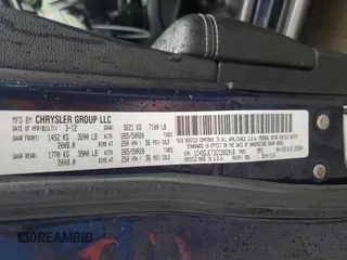 2012 Dodge Durango Citadel z VIN 1C4SDJET3CC282918, wystawiony jako Copart lot #51588995 z przebiegiem 207 999 mil mil oraz Szkoda całkowita • Salvage title. Historia ofert i sprzedaży dostępna na DreamBid. Obrazek 13.