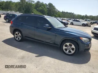 2013 BMW X1 28i z VIN WBAVM1C59DVW41709, wystawiony jako Copart lot #57316485 z przebiegiem 115 563 mil mil oraz Tytuł czysty. Historia ofert i sprzedaży dostępna na DreamBid. Obrazek 4.