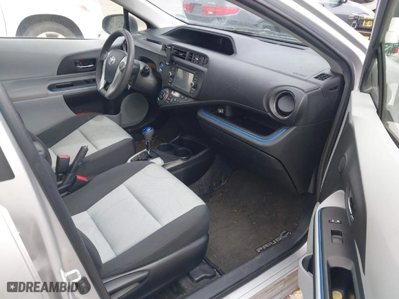 2013 Toyota Prius c One with VIN JTDKDTB32D1035449, listed as a IAAI auction lot 41799633 with 132,518 mi miles. Bid and sale history available at carsss.com. Image 5.