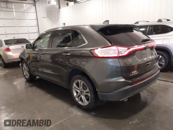 2017 Ford Edge Titanium z VIN 2FMPK4K95HBB57606, wystawiony jako IAAI lot #42139449 z przebiegiem 117 228 mil mil oraz . Historia ofert i sprzedaży dostępna na DreamBid. Obrazek 3.