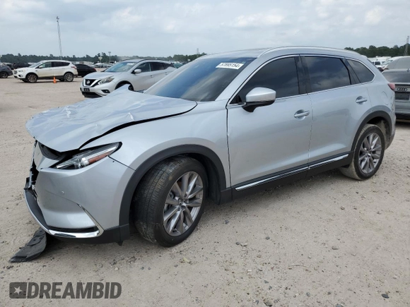 2021 Mazda CX-9 Grand Touring z VIN JM3TCADY6M0501370, wystawiony jako Copart lot #57895154 z przebiegiem 19 726 mil mil oraz Szkoda całkowita • Salvage title. Historia ofert i sprzedaży dostępna na DreamBid. Obrazek 1.