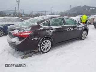 2014 Toyota Avalon Limited with VIN 4T1BK1EB1EU106004, listed as a IAAI auction lot 41341771 with 86,608 mi miles and . Bid and sale history available at DreamBid. Image 4.