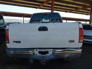 2003 Ford F-150 XL with VIN 1FTRX18L03NA45728, listed as a IAAI auction lot 41860421 with 179,596 mi miles. Bid and sale history available at carsss.com. Image 16.