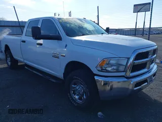 2013 Ram 2500 Tradesman z VIN 3C6TR5HT9DG575642, wystawiony jako IAAI lot #41557823 z przebiegiem 223 859 mil mil oraz . Historia ofert i sprzedaży dostępna na DreamBid. Obrazek 1.