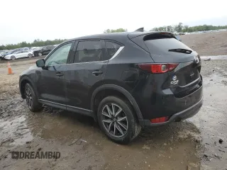 2018 Mazda CX-5 Touring z VIN JM3KFBCM4J0377280, wystawiony jako Copart lot #56688575 z przebiegiem 101 167 mil mil oraz Czysty tytuł • Clean title. Historia ofert i sprzedaży dostępna na DreamBid. Obrazek 2.