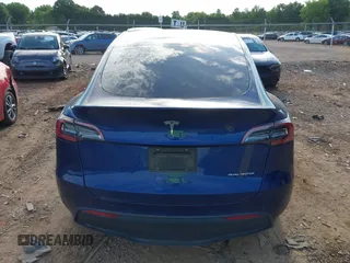 2022 Tesla Model Y Long Range z VIN 7SAYGDEE0NF429399, wystawiony jako IAAI lot #42333630 z przebiegiem 32 937 mil mil oraz . Historia ofert i sprzedaży dostępna na DreamBid. Obrazek 16.