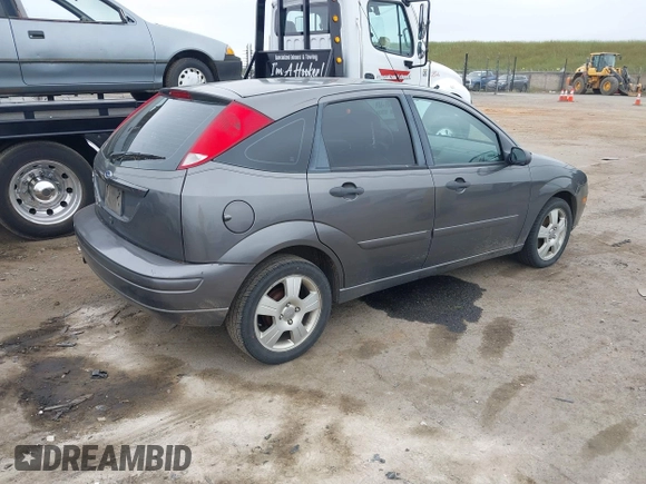 2007 Ford Focus S z VIN 1FAFP37N07W343784, wystawiony jako IAAI lot #42036642 z przebiegiem 223 104 mil mil oraz . Historia ofert i sprzedaży dostępna na DreamBid. Obrazek 4.