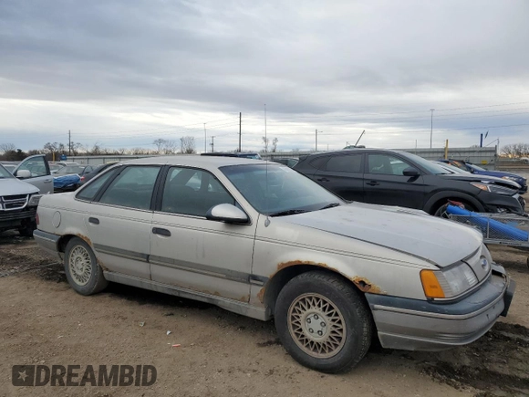 1991 Ford Taurus with VIN 1FACP52U9MG101093, listed as a Copart auction lot 45948105 with 594,696 mi miles and Salvage title. Bid and sale history available at DreamBid. Image 4.