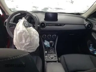 2021 Mazda CX-3 Touring z VIN JM1DKFC73M1503805, wystawiony jako Copart lot #38996603 z przebiegiem Nie podano mil oraz . Historia ofert i sprzedaży dostępna na DreamBid. Obrazek 8.