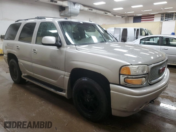 2005 GMC Yukon Denali z VIN 1GKEK63U45J222600, wystawiony jako Copart lot #51329775 z przebiegiem 287 293 mil mil oraz Czysty tytuł • Clean title. Historia ofert i sprzedaży dostępna na DreamBid. Obrazek 4.