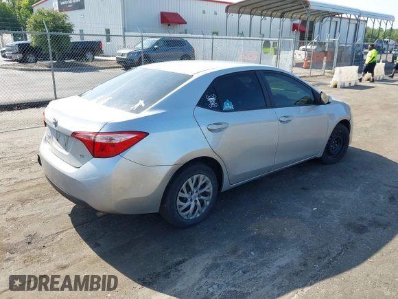 2018 Toyota Corolla L with VIN 5YFBURHEXJP810003, listed as a IAAI auction lot 42526648 with 84,546 mi miles and . Bid and sale history available at DreamBid. Image 4.