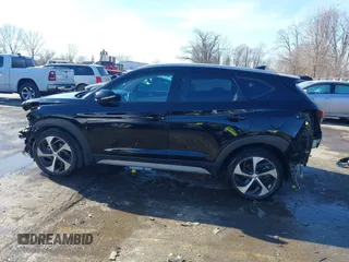 2018 Hyundai Tucson Sport with VIN KM8J33ALXJU771481, listed as a IAAI auction lot 41399335 with 64,905 mi miles. Bid and sale history available at carsss.com. Image 15.