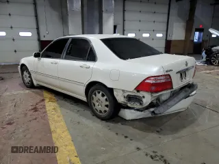 2004 Acura RL w/Navigation System with VIN JH4KA96644C004559, listed as a Copart auction lot 86161794 with 101,379 mi miles and Salvage Title. Bid and sale history available at carsss.com. Image 2.