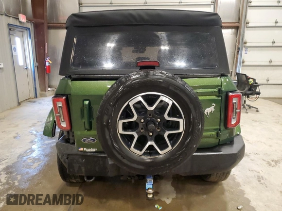 2022 Ford Bronco with VIN 1FMDE5DH1NLB59322, listed as a Copart auction lot 57809495 with 64,094 mi miles and Salvage title. Bid and sale history available at DreamBid. Image 6.