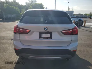 2018 BMW X1 sDrive28i z VIN WBXHU7C39J5H42980, wystawiony jako Copart lot #59308535 z przebiegiem 122 135 mil mil oraz Czysty tytuł • Clean title. Historia ofert i sprzedaży dostępna na DreamBid. Obrazek 6.