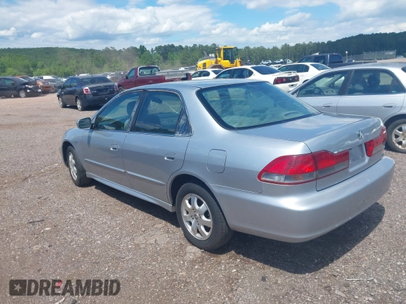 2002 Honda Accord EX z VIN 1HGCG56622A013090, wystawiony jako IAAI lot #42132291 z przebiegiem 152 567 mil mil oraz . Historia ofert i sprzedaży dostępna na DreamBid. Obrazek 3.