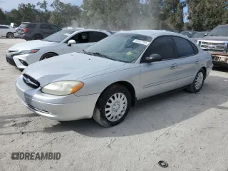 2003 Ford Taurus LX with VIN 1FAFP52U43A110444, listed as a Copart auction lot 83557764 with 118,897 mi miles and Salvage Title. Bid and sale history available at carsss.com. Image 1.