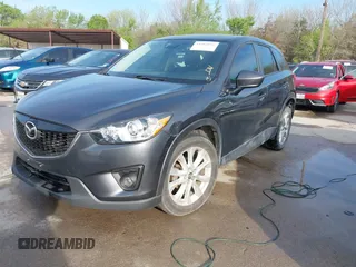 2014 Mazda CX-5 Grand Touring with VIN JM3KE2DY7E0345742, listed as a IAAI auction lot 41864116 with 158,746 mi miles. Bid and sale history available at carsss.com. Image 18.