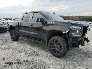 2022 Chevrolet Silverado 1500 LT Trail Boss with VIN 1GCPYFEL3NZ213931, listed as a Copart auction lot 43682135 with 57,428 mi miles and Salvage Title. Bid and sale history available at DreamBid. Image 4.