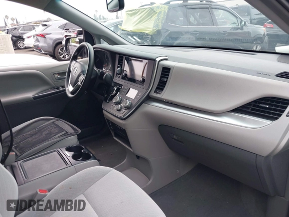 2015 Toyota Sienna LE AAS with VIN 5TDKK3DC7FS649602, listed as a IAAI auction lot 42152836 with 70,892 mi miles and . Bid and sale history available at DreamBid. Image 5.