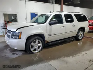 2012 Chevrolet Suburban LTZ with VIN 1GNSKKE74CR325522, listed as a Copart auction lot 52215745 with 214,973 mi miles and Clean Title. Bid and sale history available at carsss.com. Image 1.