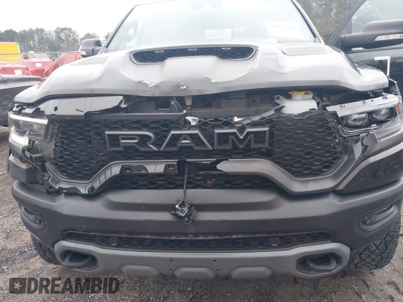 2022 Ram 1500 TRX with VIN 1C6SRFU9XNN476106, listed as a IAAI auction lot 41627895 with 21,992 mi miles and . Bid and sale history available at DreamBid. Image 6.